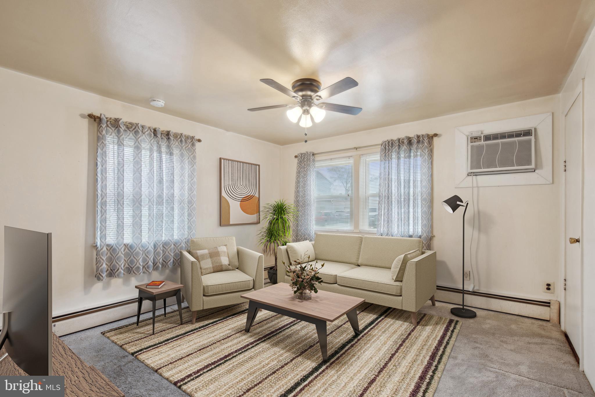 1600 Oriole Road Edgewater, MD 21037 - Photo 2 of 41 a living room with furniture and a large window