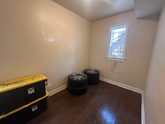 a room with a bed and a window