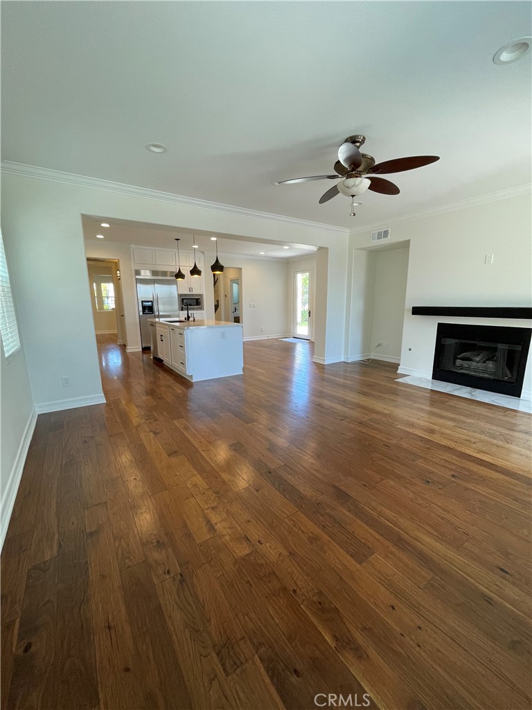 72 Downing Street Ladera Ranch, CA 92694 - Photo 4 of 14 a view of a livingroom with furniture nad wooden floor