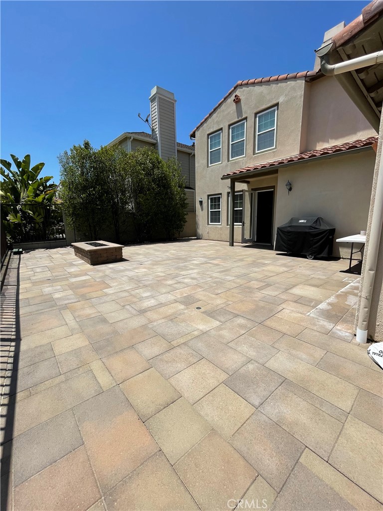 72 Downing Street Ladera Ranch, CA 92694 - Photo 5 of 14 a front view of a house with a yard