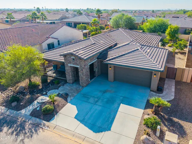 a aerial view of a house with a patio