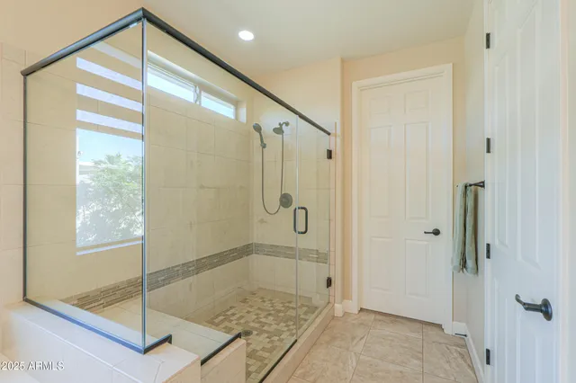 a view of a patio with table and chairs and potted plants