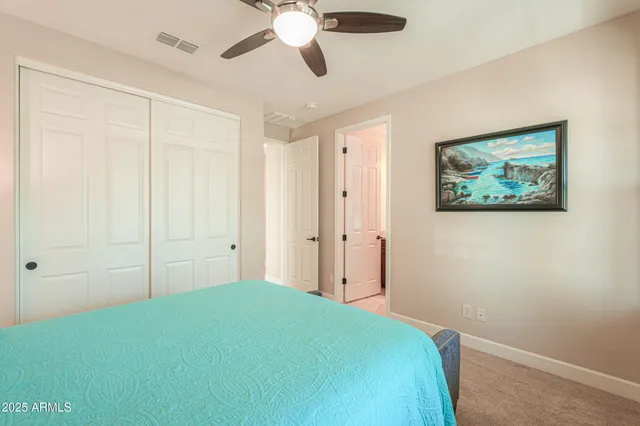 a view of a patio with a table and chairs