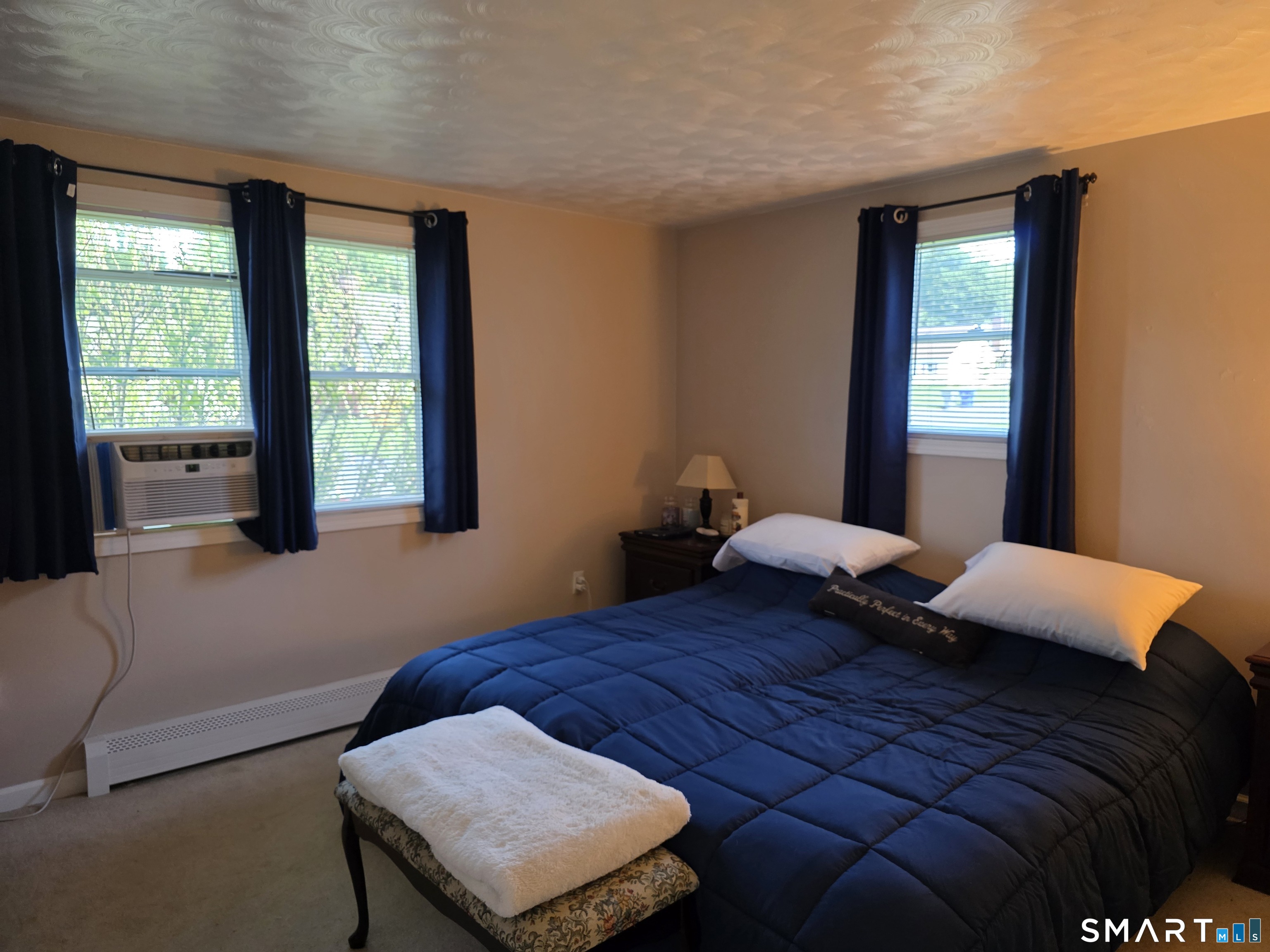 15 Van Buren Road Enfield, CT 06082 - Photo 25 of 40 a bedroom with a bed and window