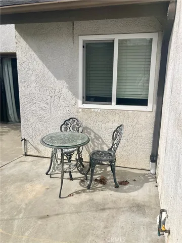a view of a door and a car parked in garage
