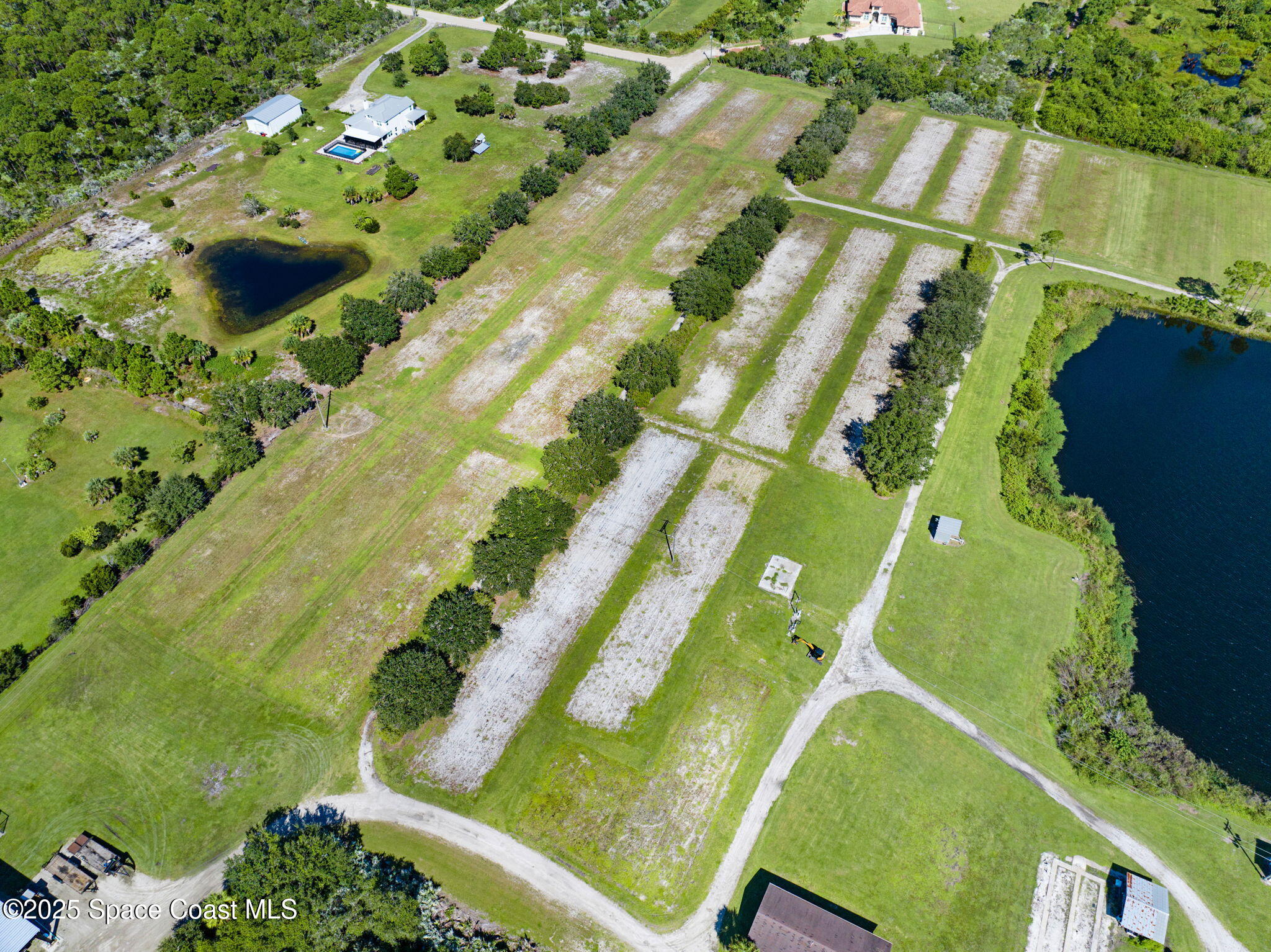 D Berry Road Grant Valkaria, FL 32949 - Photo 17 of 46 a view of a swimming pool