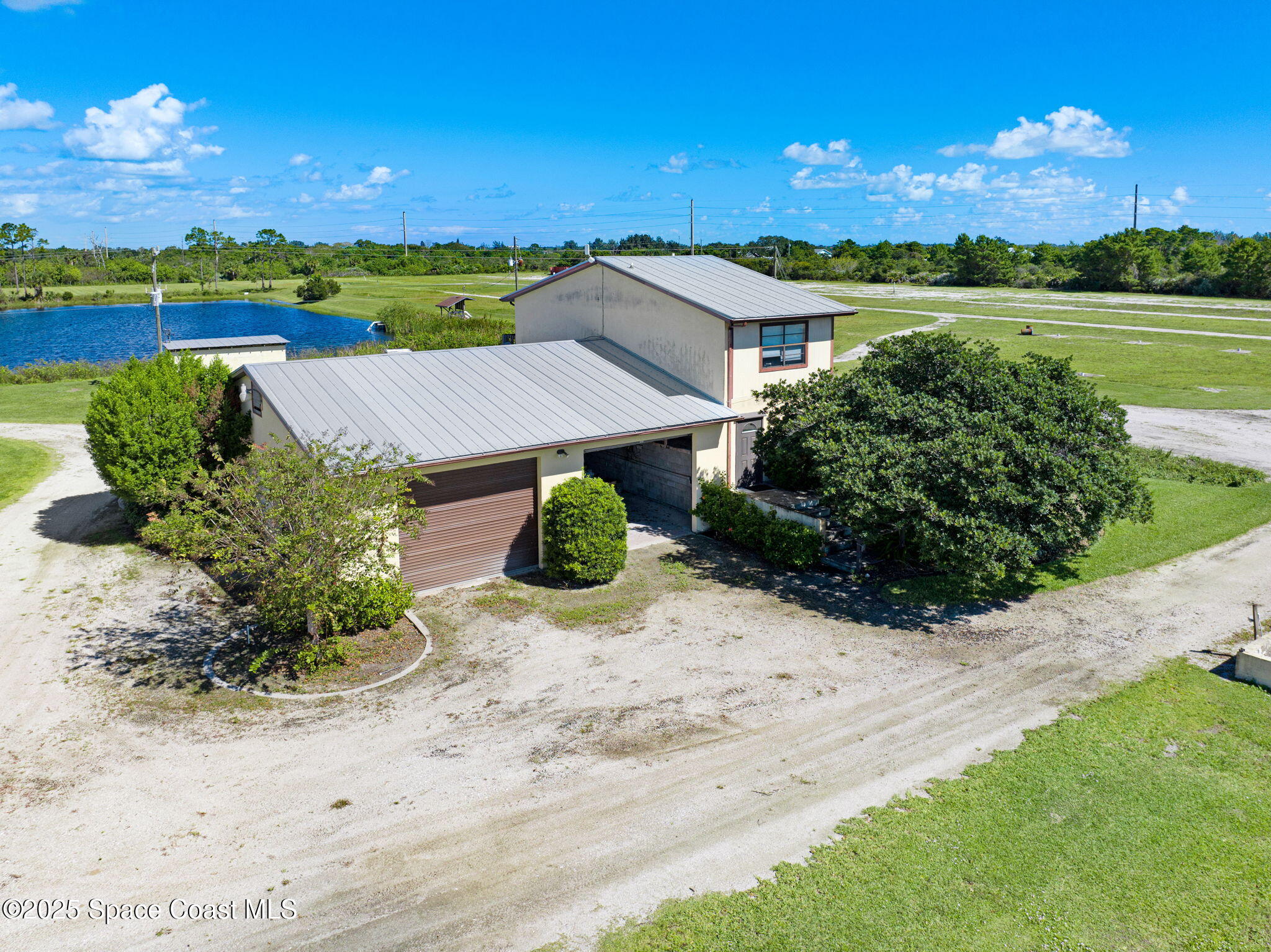 D Berry Road Grant Valkaria, FL 32949 - Photo 7 of 46 a view of a lake with outdoor space