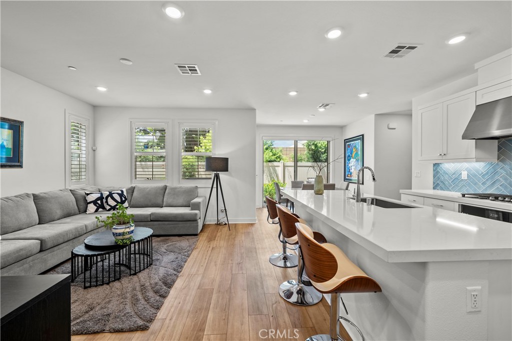 1663 Rosewell Road West Covina, CA 91791 - Photo 13 of 45 a living room with furniture and kitchen view