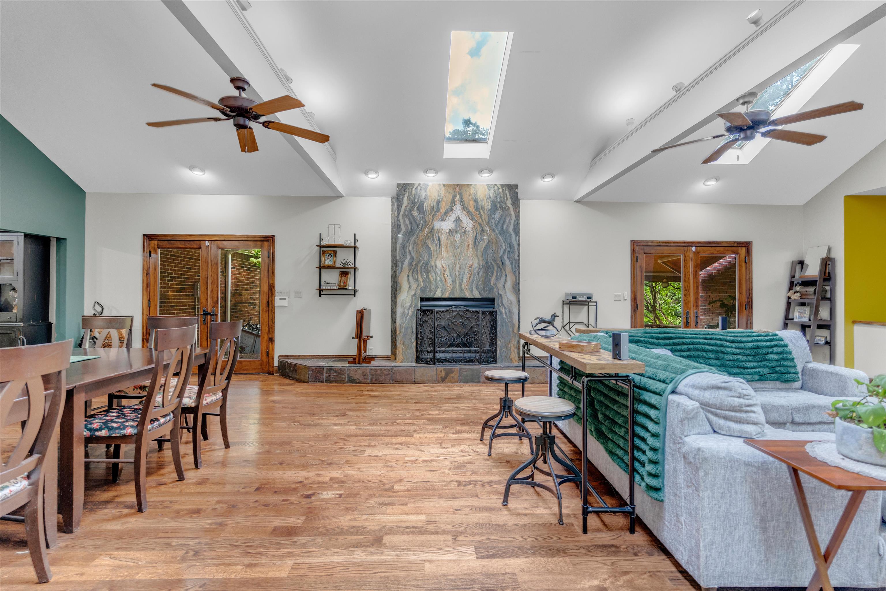 115 Westwood Cove Ripley, TN 38063 - Photo 17 of 40 a living room with furniture a wooden floor and a ceiling fan