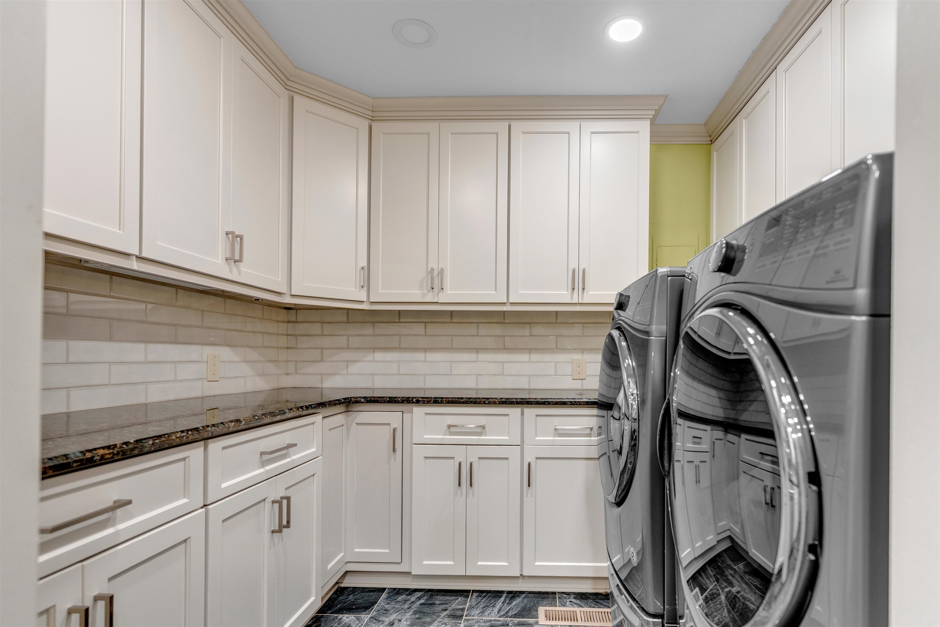 115 Westwood Cove Ripley, TN 38063 - Photo 20 of 40 a utility room with cabinets