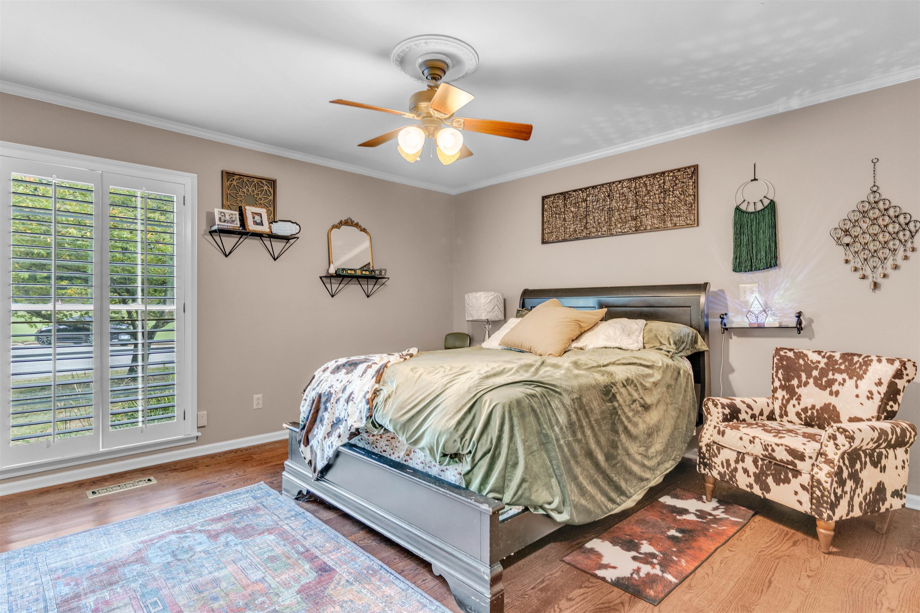 115 Westwood Cove Ripley, TN 38063 - Photo 21 of 40 a bedroom with a bed and window