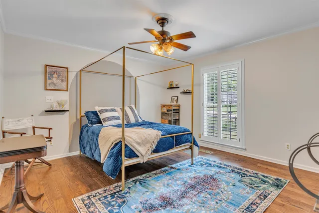 a bed room with a bed and a window