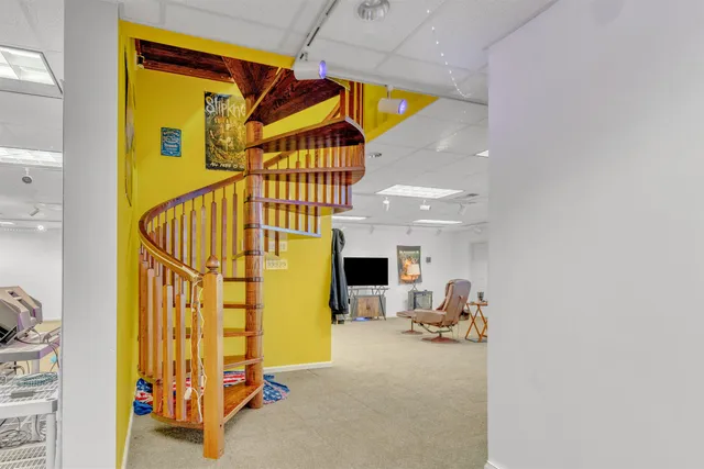 a view of a living room and bathroom