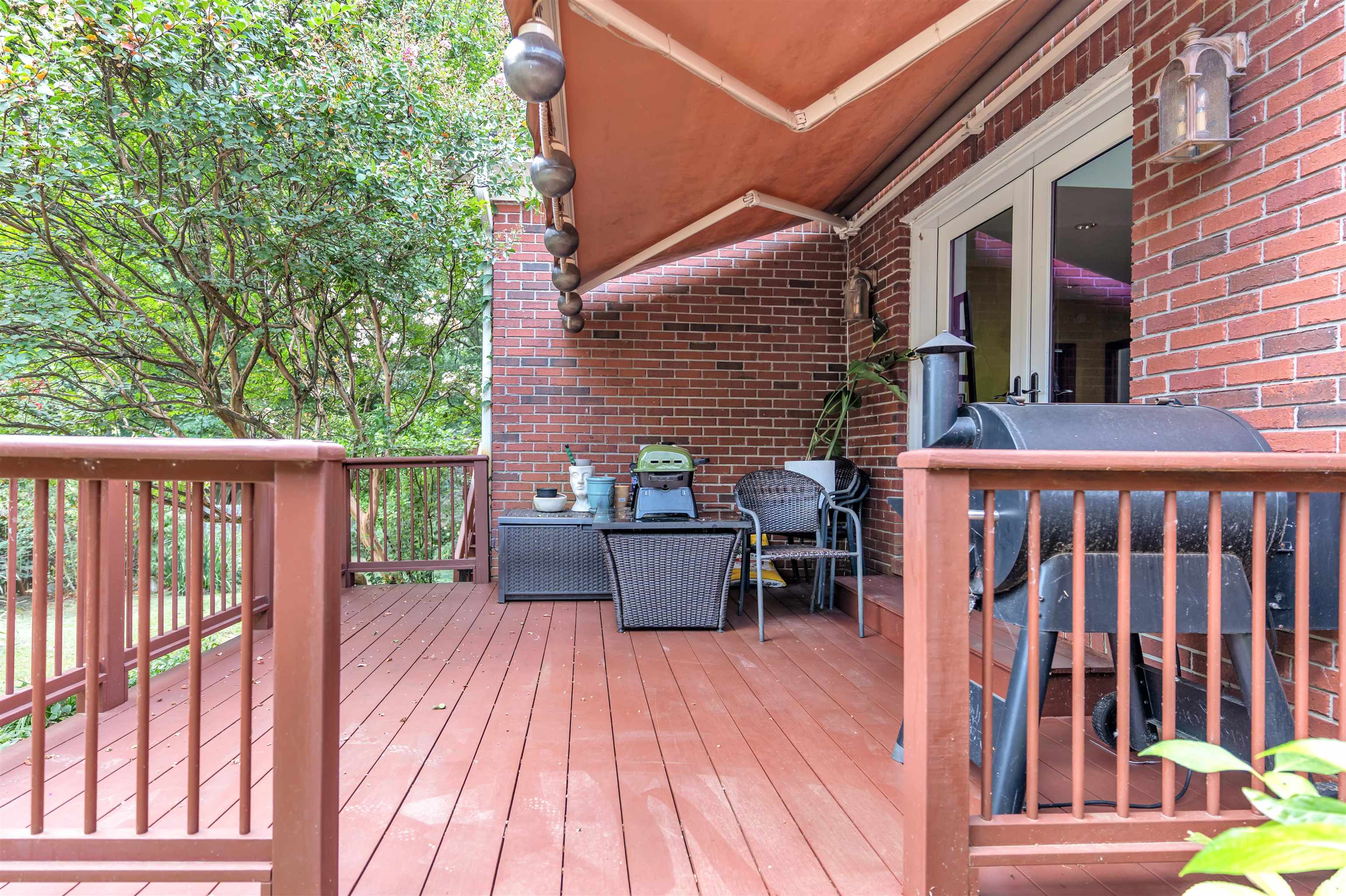 115 Westwood Cove Ripley, TN 38063 - Photo 29 of 40 a view of backyard with a deck and wooden floor