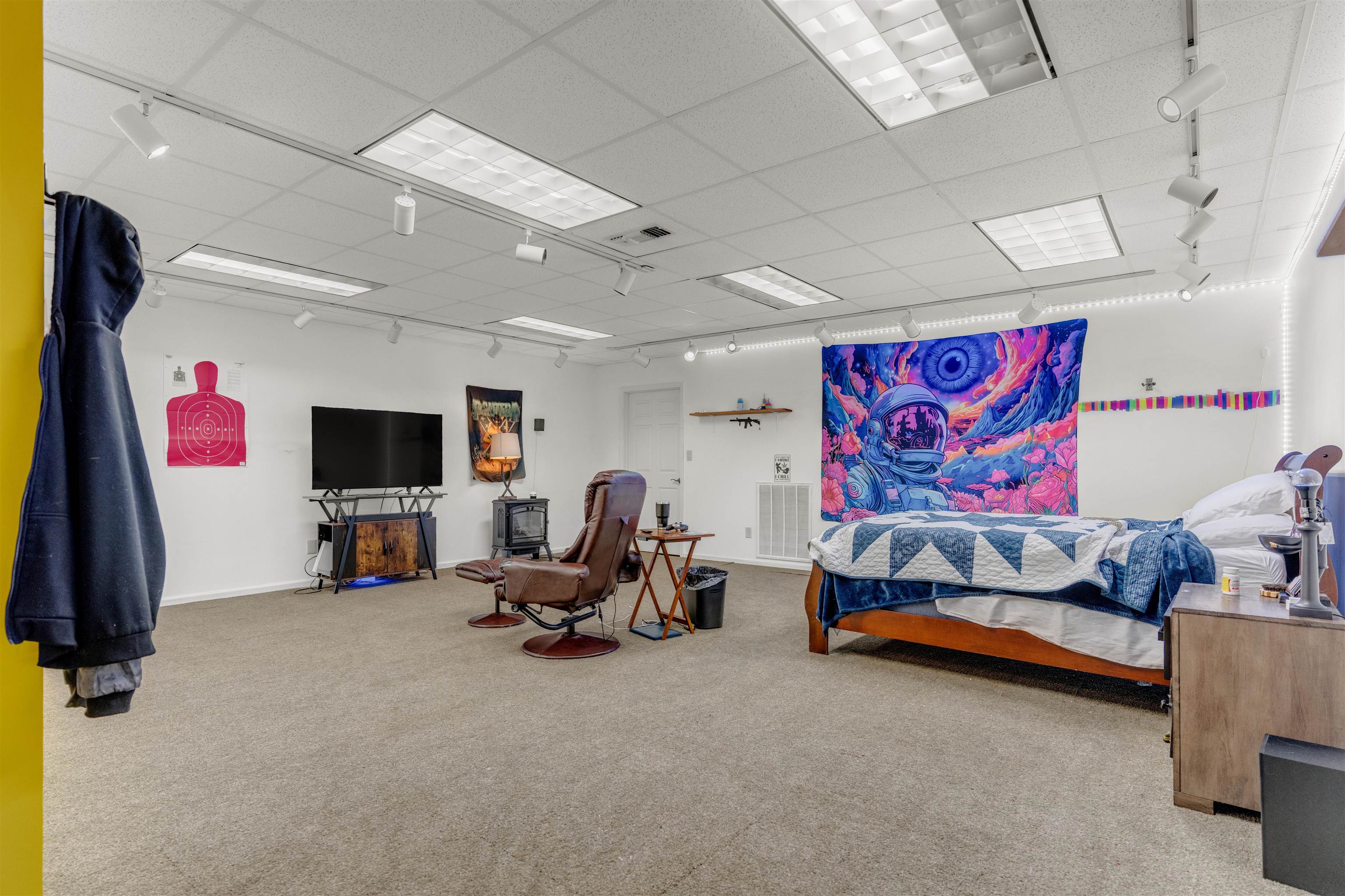 115 Westwood Cove Ripley, TN 38063 - Photo 39 of 40 a living room with furniture and a flat screen tv