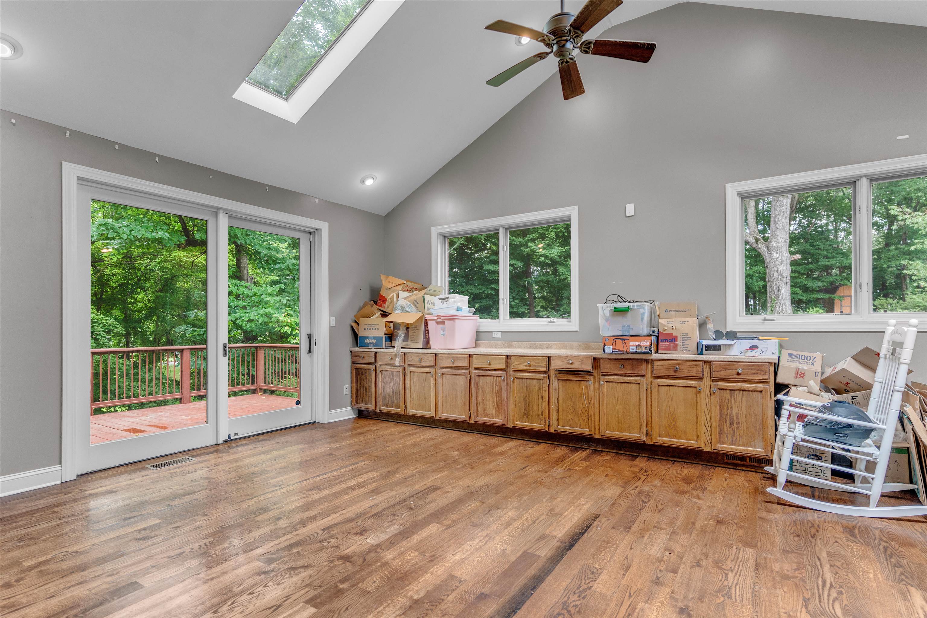 115 Westwood Cove Ripley, TN 38063 - Photo 6 of 40 a kitchen with stainless steel appliances wooden floors and window