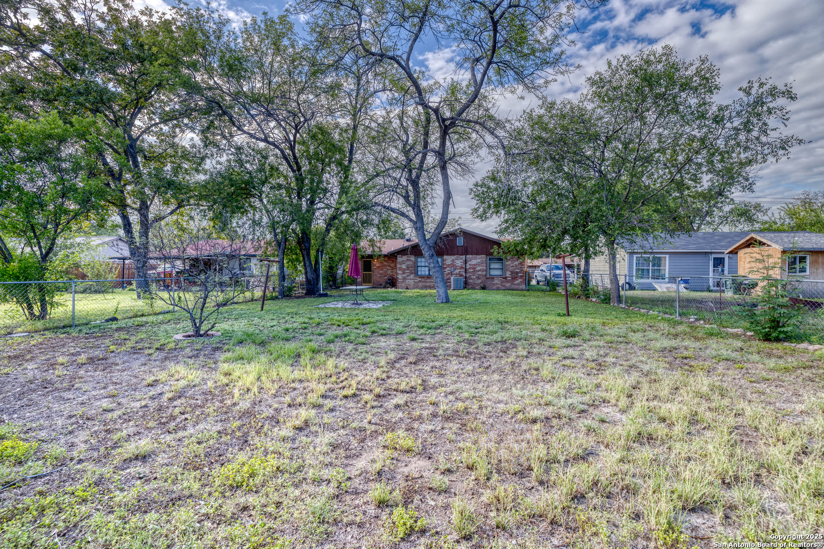 313 Bohme Street Uvalde, TX 78801 - Photo 14 of 23 a view of a house with a yard