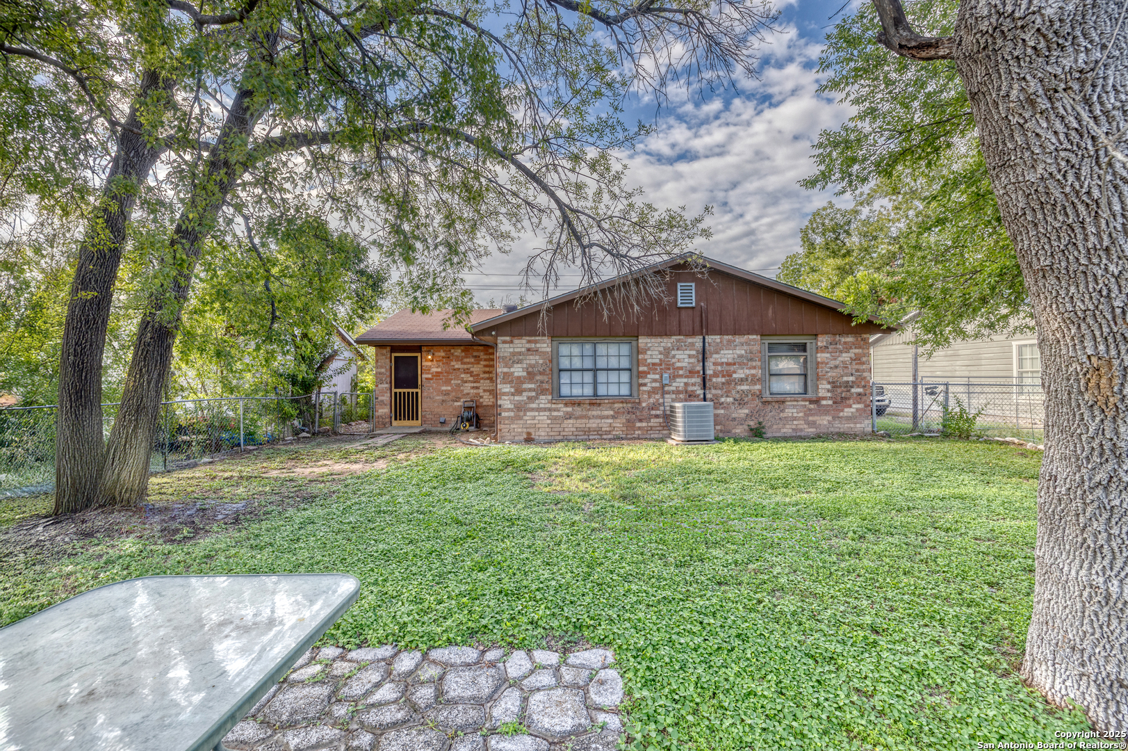313 Bohme Street Uvalde, TX 78801 - Photo 17 of 23 a view of a house with a yard