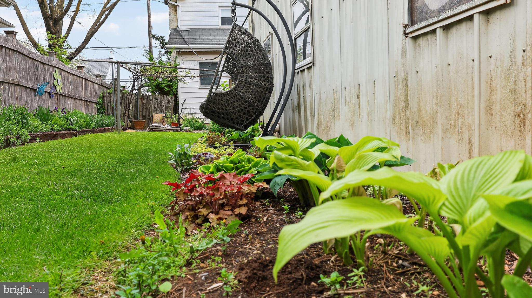 40 Queen Road Intercourse, PA 17529 - Photo 36 of 58 a view of a backyard with plants