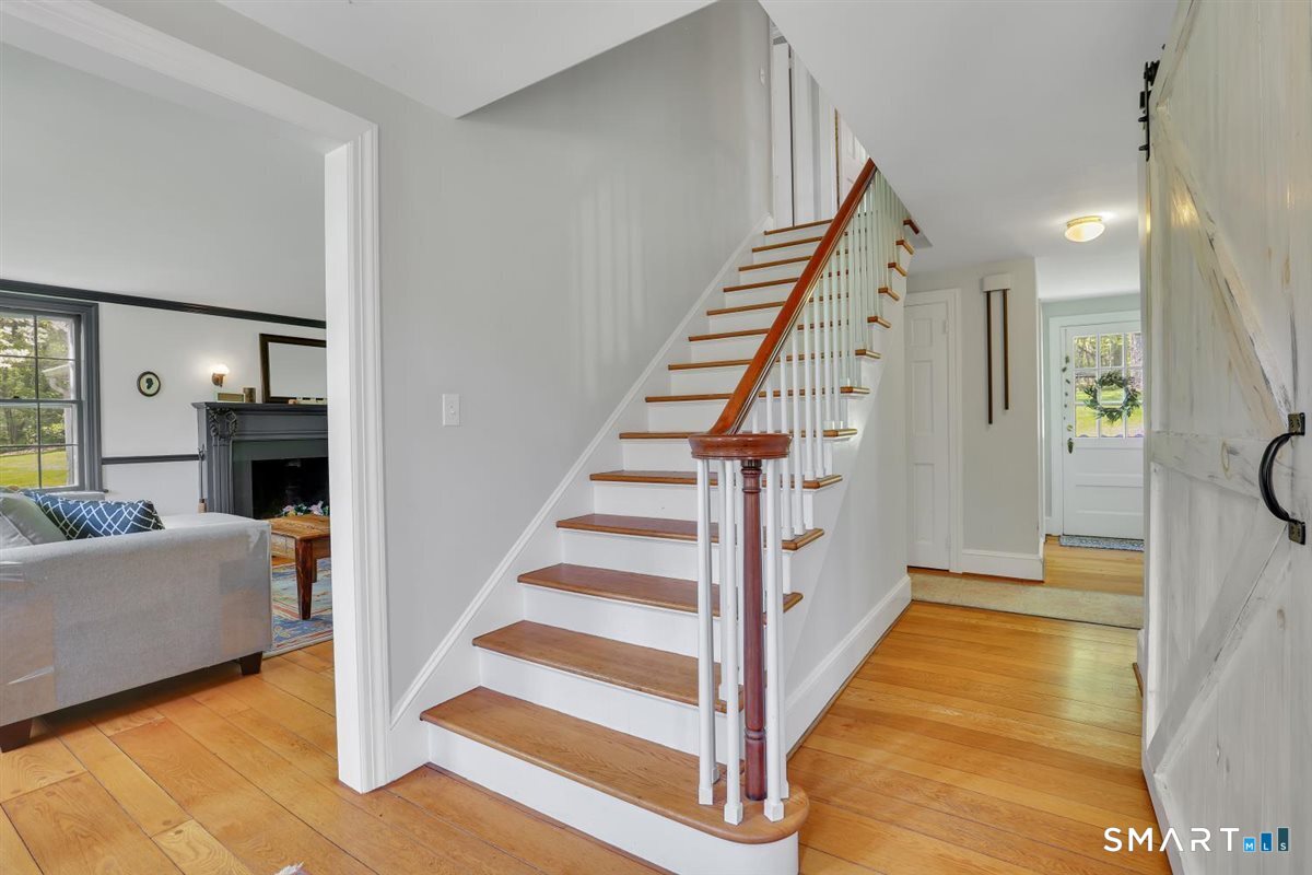 292 Parmelee Hill Road Durham, CT 06422 - Photo 22 of 39 Front hallway and staircase