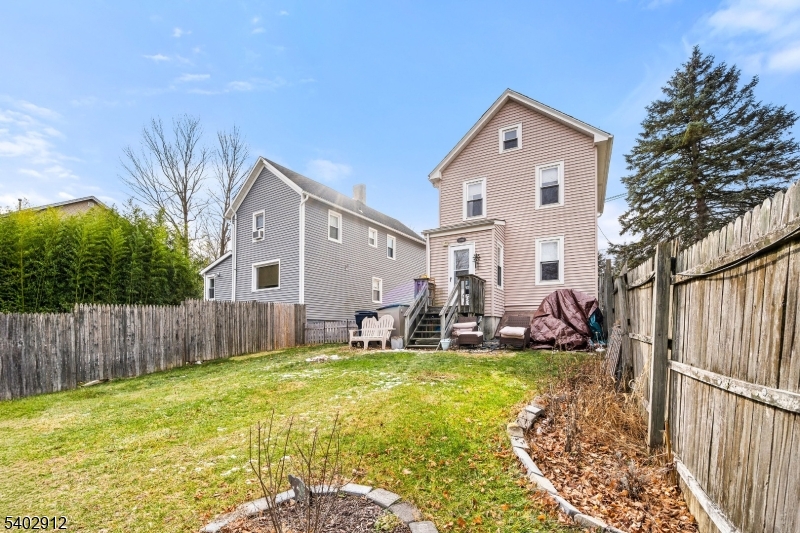 89 Trinity Street Newton, NJ 07860 - Photo 2 of 21 a front view of house with patio and yard