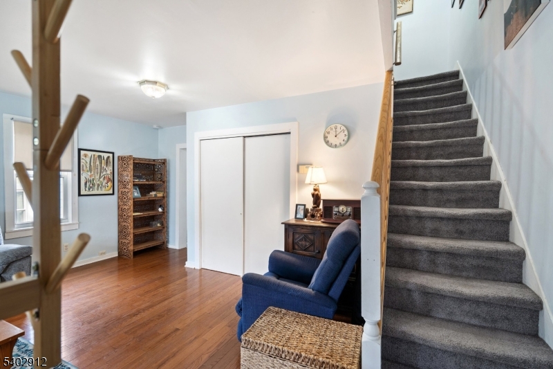 89 Trinity Street Newton, NJ 07860 - Photo 7 of 21 a view of livingroom with furniture and wooden floor