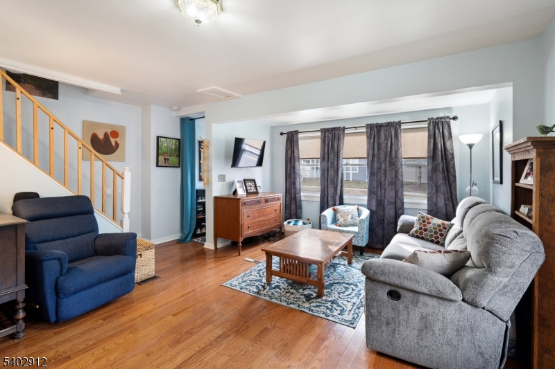 89 Trinity Street Newton, NJ 07860 - Photo 9 of 21 a living room with furniture and large windows