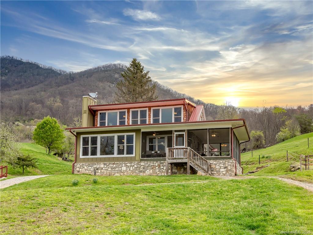 390 Grandview Road Canton, NC 28716 - Photo 1 of 42 a view of a house with a swimming pool