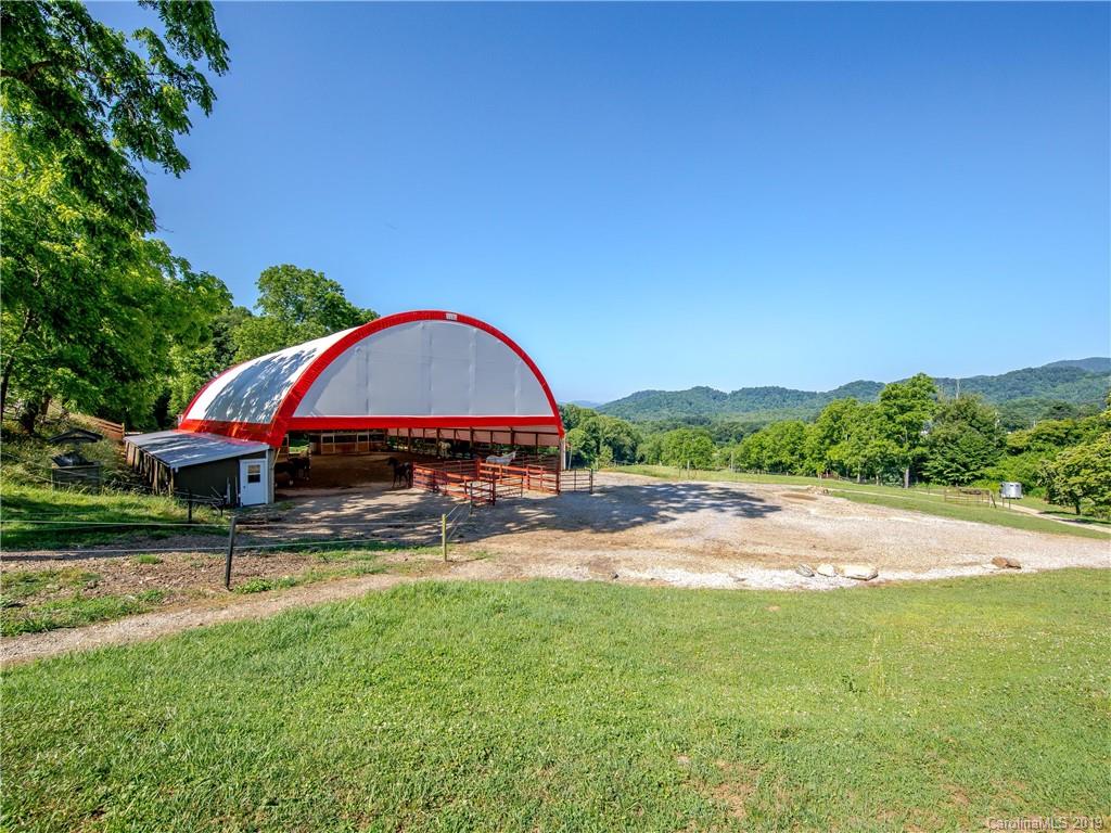 390 Grandview Road Canton, NC 28716 - Photo 28 of 42 a view of swimming pool with a yard