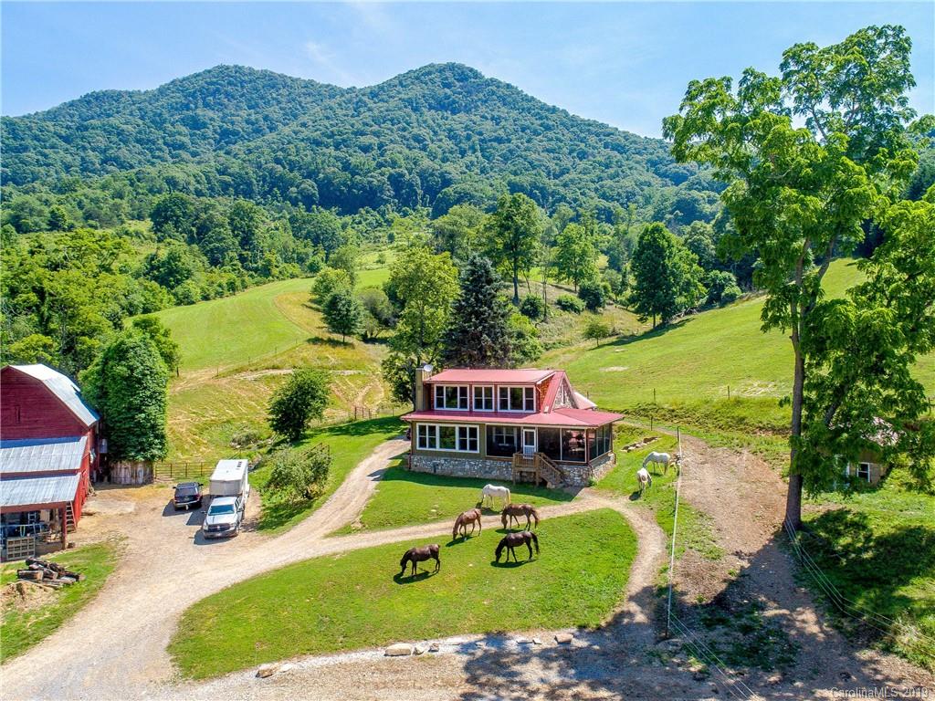 390 Grandview Road Canton, NC 28716 - Photo 37 of 42 an aerial view of a house with outdoor space swimming pool