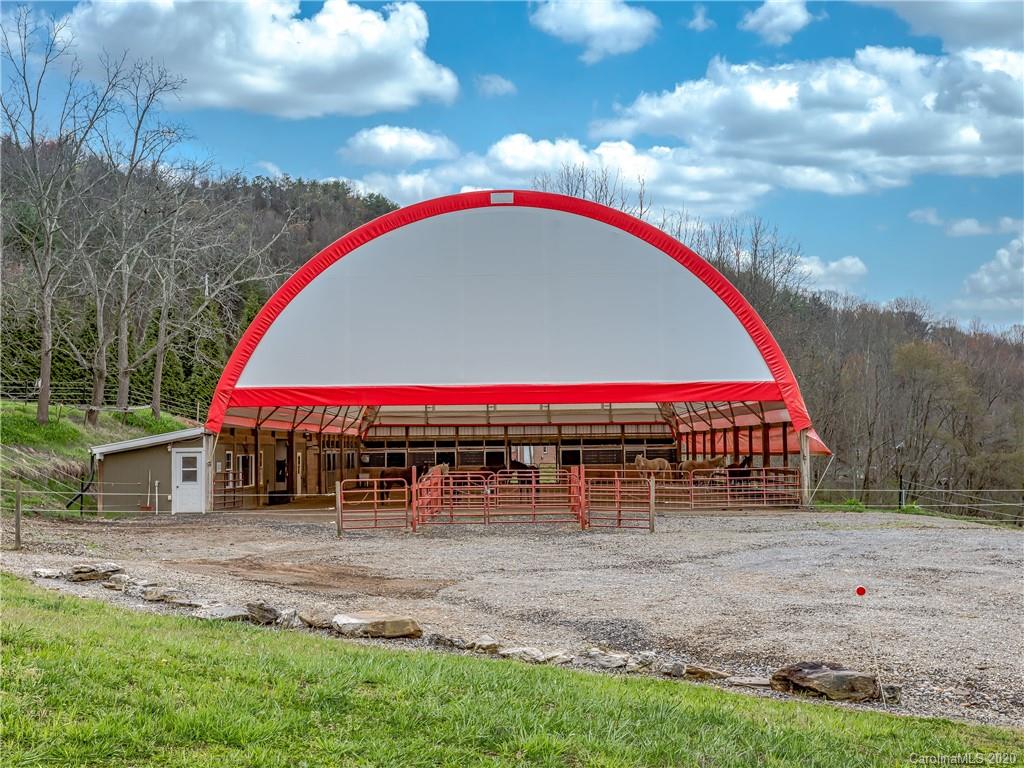 390 Grandview Road Canton, NC 28716 - Photo 41 of 42 a view of swimming pool with red outdoor seating