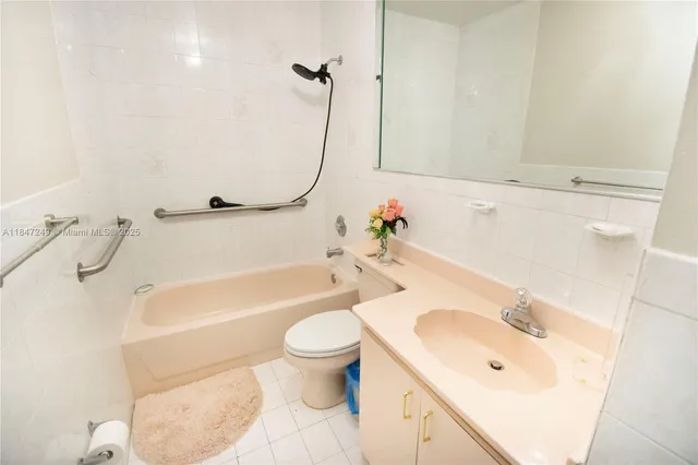 a living room with couch and stairs