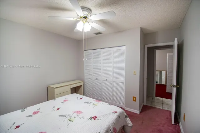 a close view of a sink and cabinets