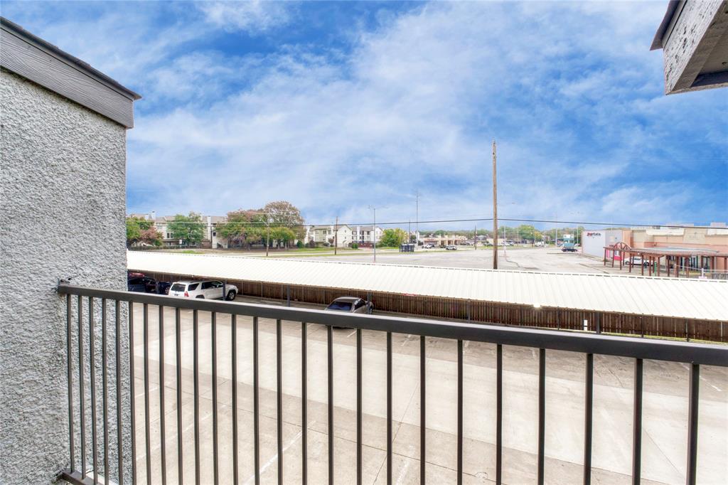 9696 Walnut Street, Unit 312 Dallas, TX 75243 - Photo 15 of 29 a city view from a balcony