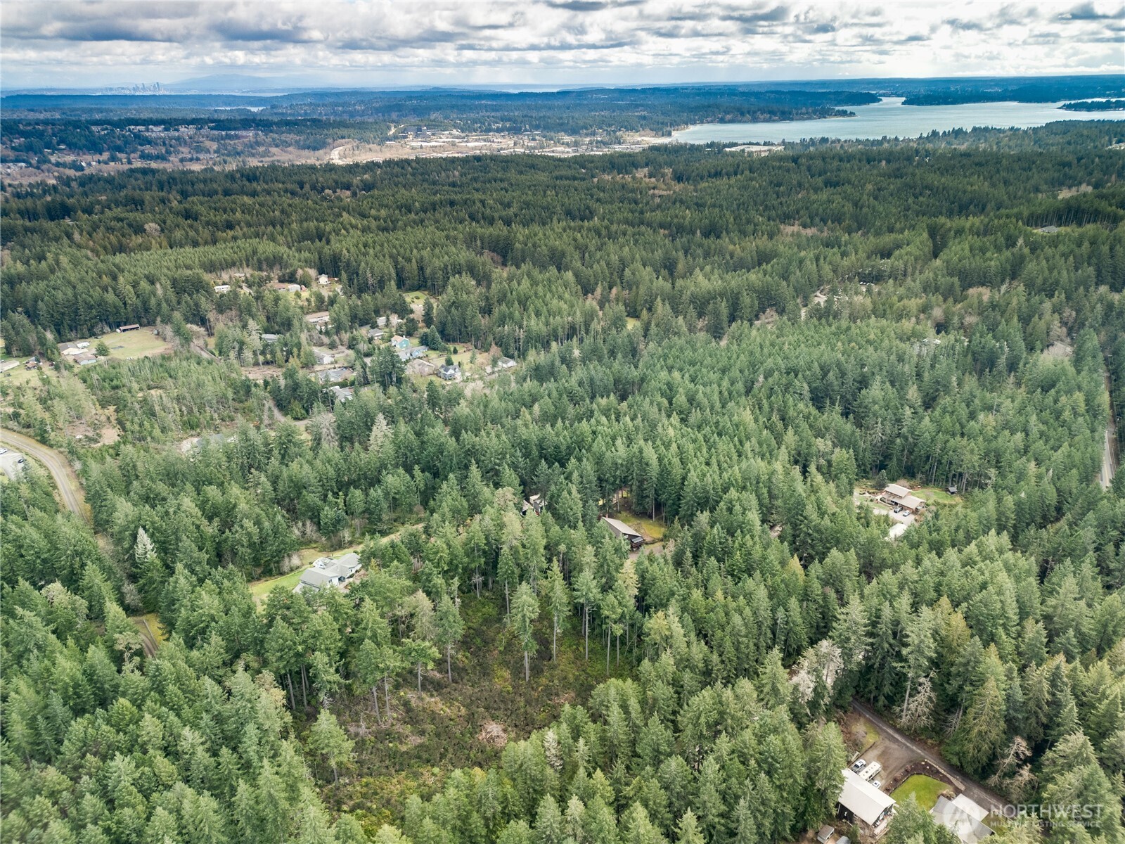 0 Olympic View Road Northwest Silverdale, WA 98383 - Photo 10 of 14 a view of a field with an ocean