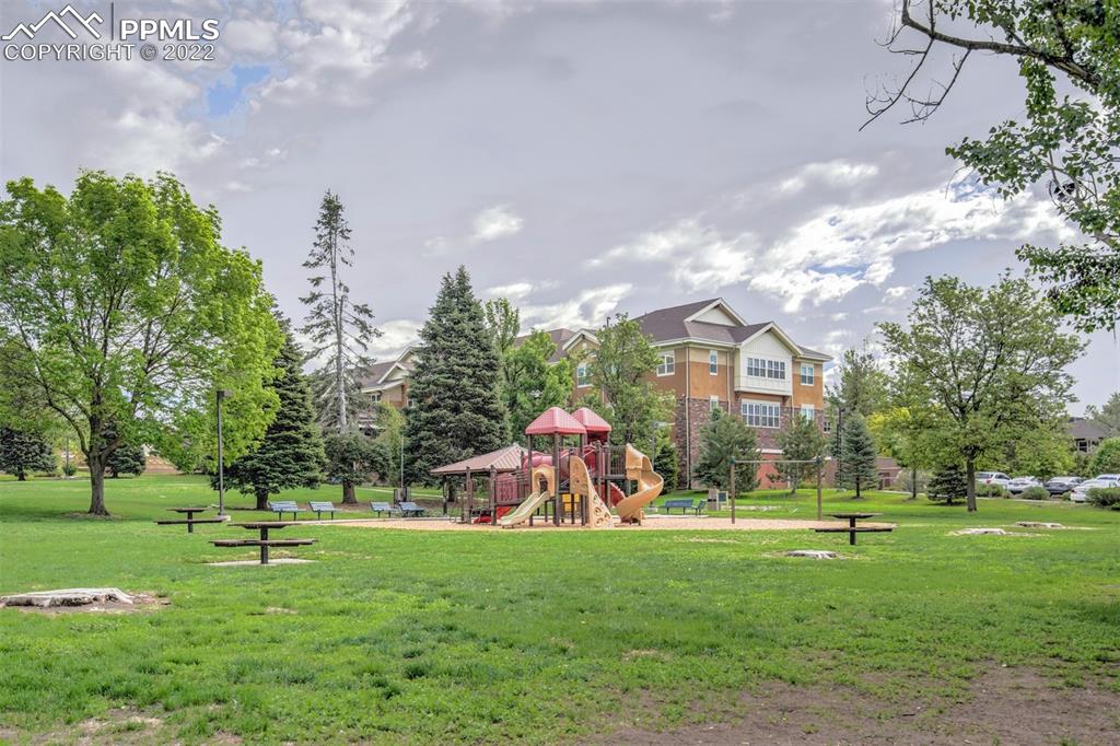 789 Alexander Road, Unit D Colorado Springs, CO 80909 - Photo 36 of 36 a view of a park with large trees