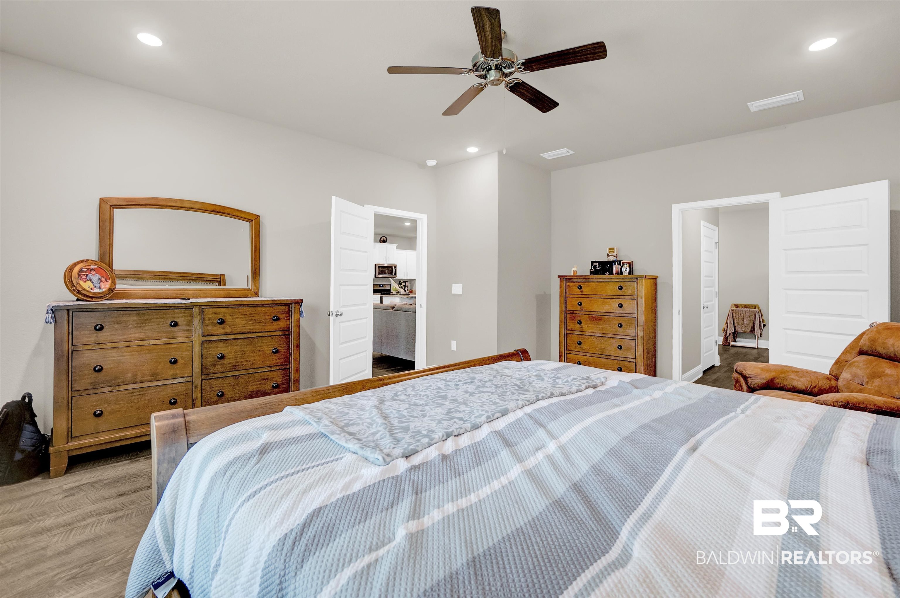 31671 Memphis Loop Daphne, AL 36527 - Photo 27 of 51 Bedroom with visible vents, wood finished floors, recessed lighting, and a ceiling fan