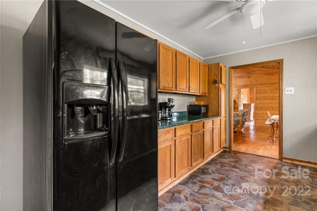 44 Jessella Drive Clyde, NC 28721 - Photo 15 of 37 a kitchen with stainless steel appliances granite countertop a refrigerator and a sink
