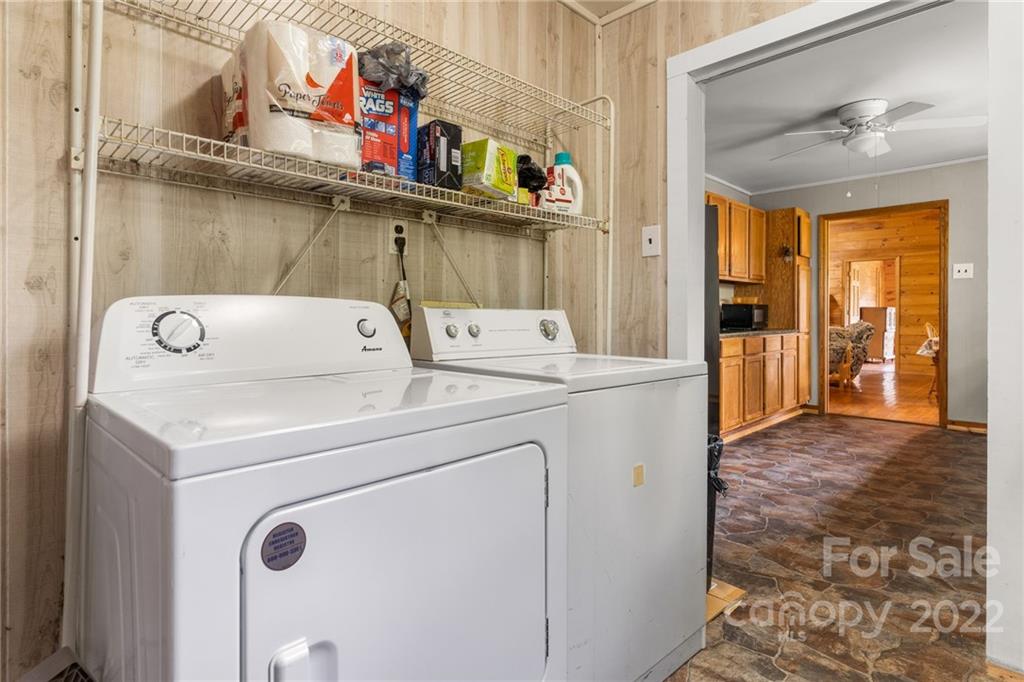 44 Jessella Drive Clyde, NC 28721 - Photo 16 of 37 a utility room with dryer and washer