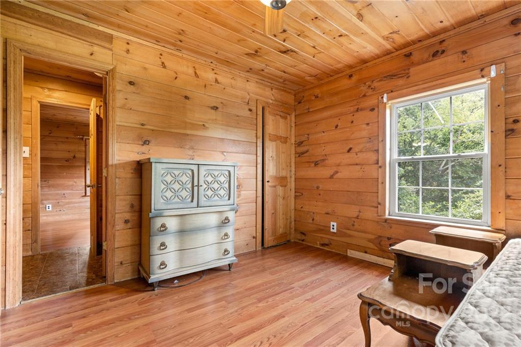 44 Jessella Drive Clyde, NC 28721 - Photo 22 of 37 wooden floor in an empty room