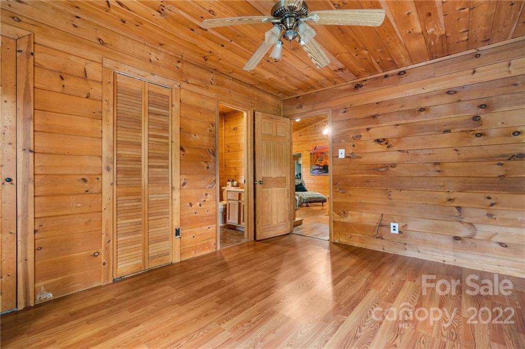 44 Jessella Drive Clyde, NC 28721 - Photo 25 of 37 a view of a livingroom with wooden floor