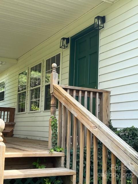 44 Jessella Drive Clyde, NC 28721 - Photo 3 of 37 a view of wooden house with a window