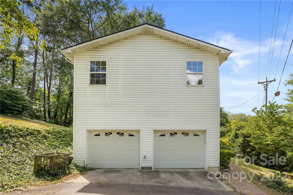 44 Jessella Drive Clyde, NC 28721 - Photo 33 of 37 a view of a house with a garage