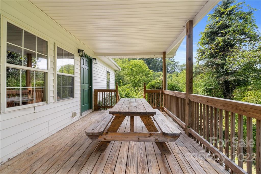 44 Jessella Drive Clyde, NC 28721 - Photo 34 of 37 a view of balcony with wooden floor