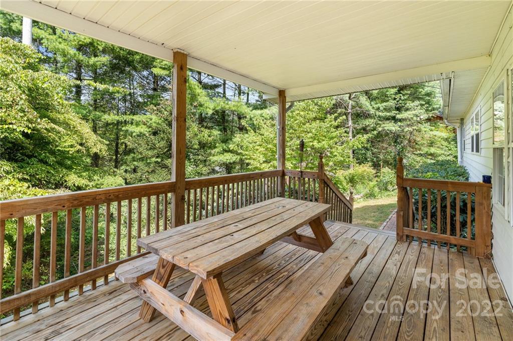 44 Jessella Drive Clyde, NC 28721 - Photo 36 of 37 a view of balcony with wooden floor and fence