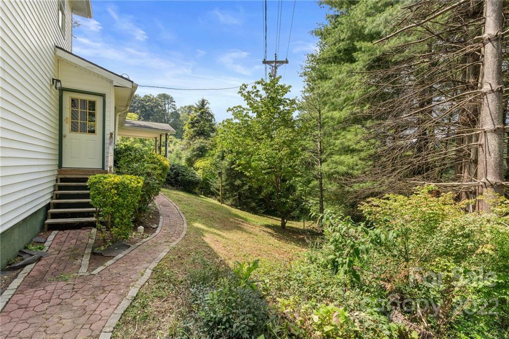 44 Jessella Drive Clyde, NC 28721 - Photo 5 of 37 a view of a garden with pathway