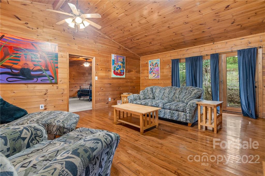 44 Jessella Drive Clyde, NC 28721 - Photo 6 of 37 a living room with furniture and a large window