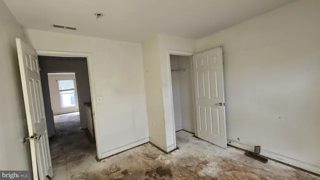 an empty room with closet