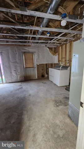 a view of kitchen with stainless steel appliances