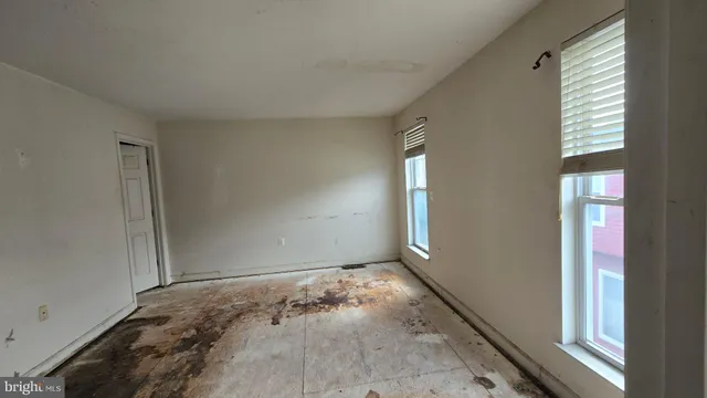 a view of a room that has a window in it